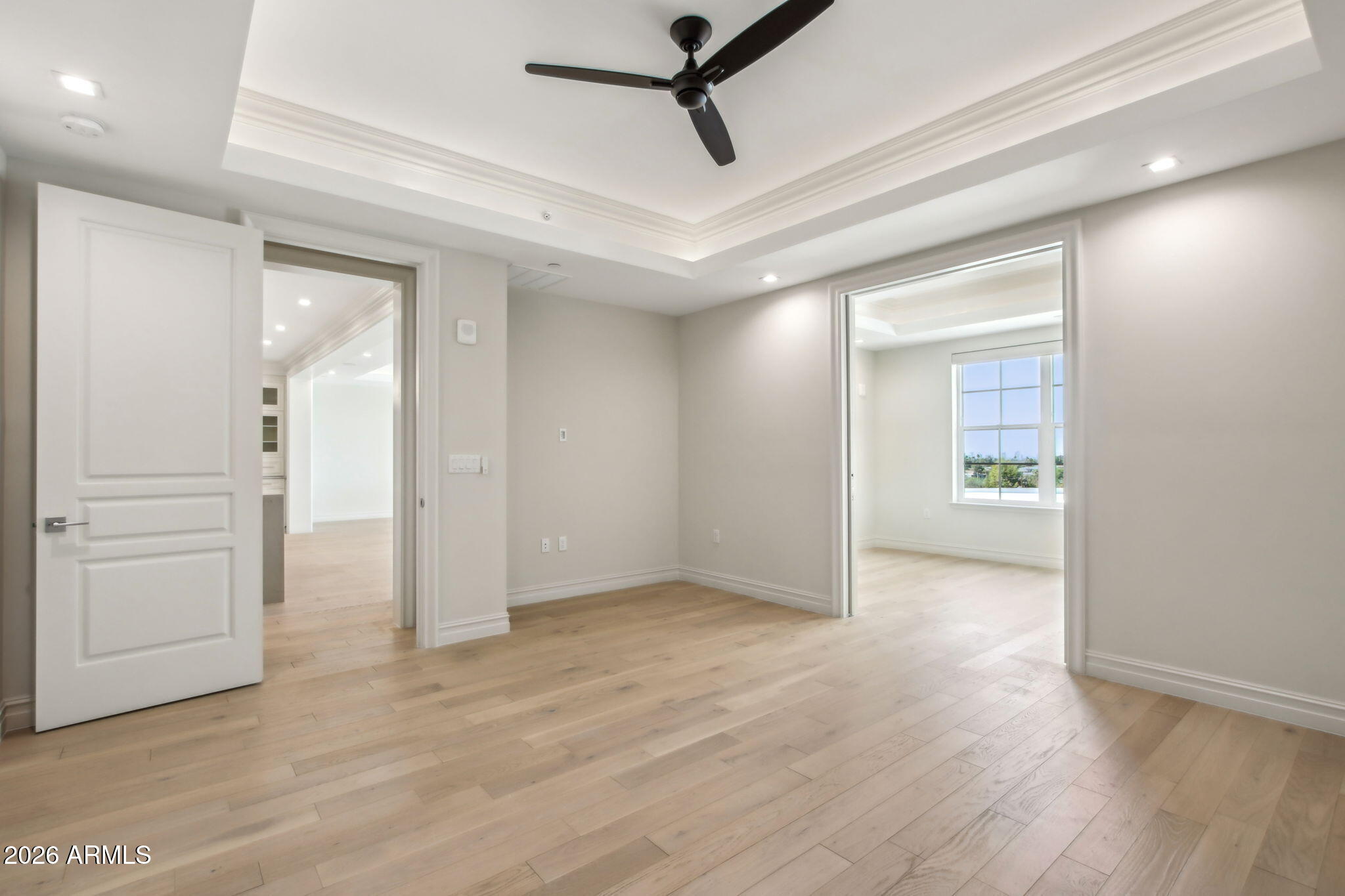 4240 East Camelback Road, Unit 514 Phoenix, AZ 85018 - Photo 7 of 16 wooden floor in an empty room