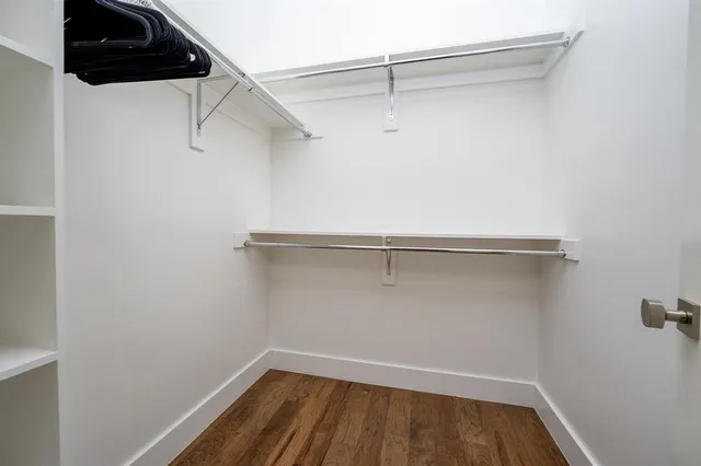 a view of a room with racks on the wall