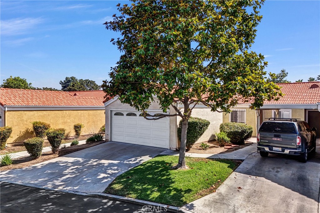 3738 Harrison Street, Unit 31 Riverside, CA 92503 - Photo 2 of 35 a view of a yard with car parked