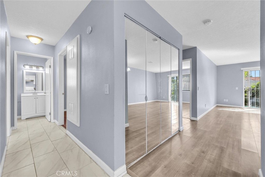 3738 Harrison Street, Unit 31 Riverside, CA 92503 - Photo 21 of 35 a view of a hallway with stainless steel appliances granite countertop furniture and a refrigerator