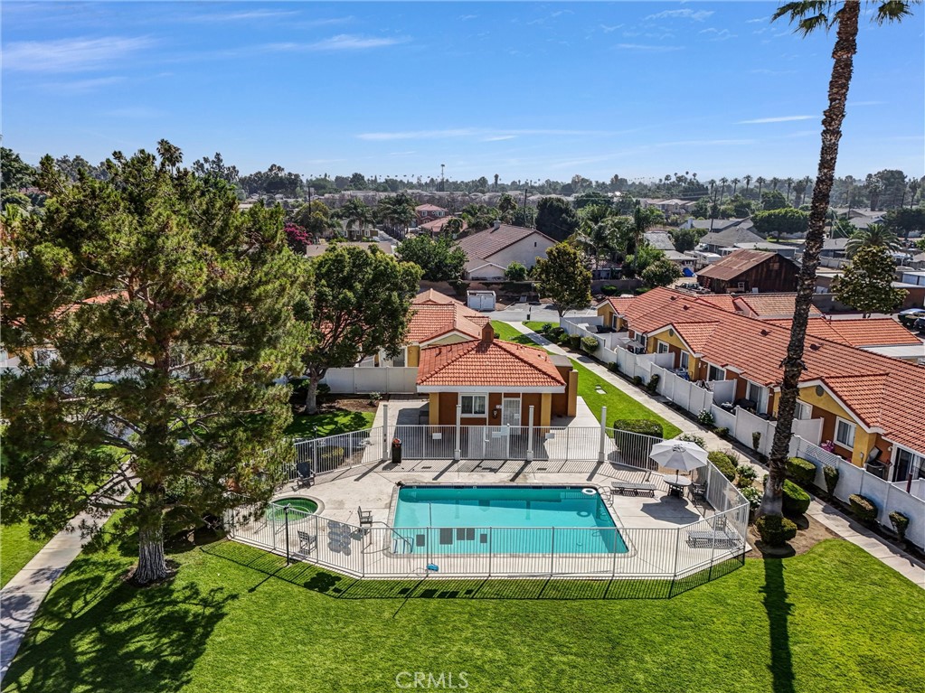 3738 Harrison Street, Unit 31 Riverside, CA 92503 - Photo 33 of 35 an aerial view of a house with a garden and swimming pool