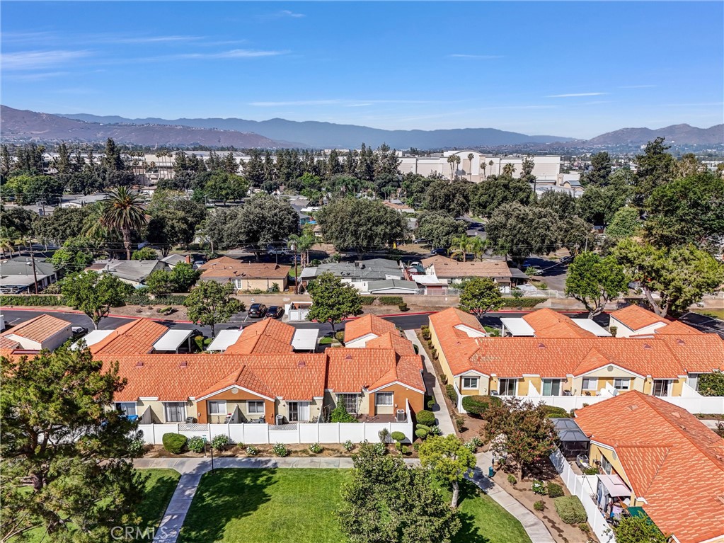 3738 Harrison Street, Unit 31 Riverside, CA 92503 - Photo 34 of 35 an aerial view of residential houses and outdoor space