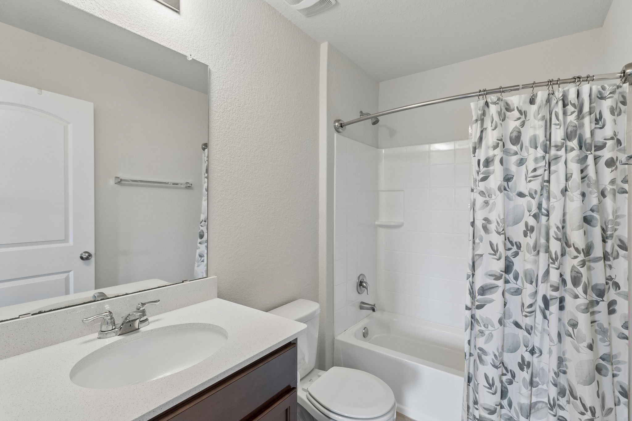 809 Whitman Avenue Georgetown, TX 78626 - Photo 26 of 35 a bathroom with a sink toilet a shower and a mirror
