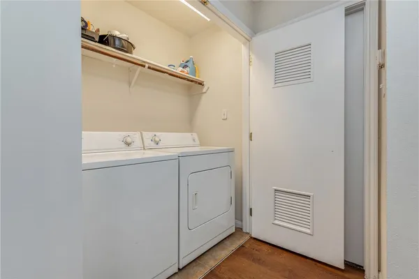 a utility room with dryer and washer