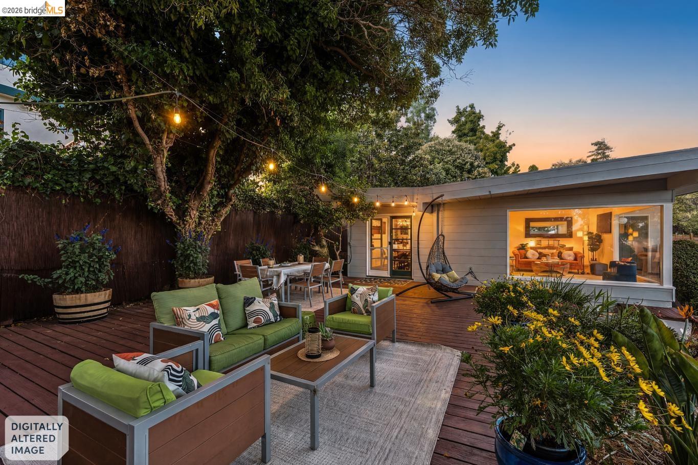 2301 Oak Street Berkeley, CA 94708 - Photo 34 of 61 Expansive wood-finish deck featuring string lighting, built-in planters, and an open-concept structure with floor-to-ceiling windows