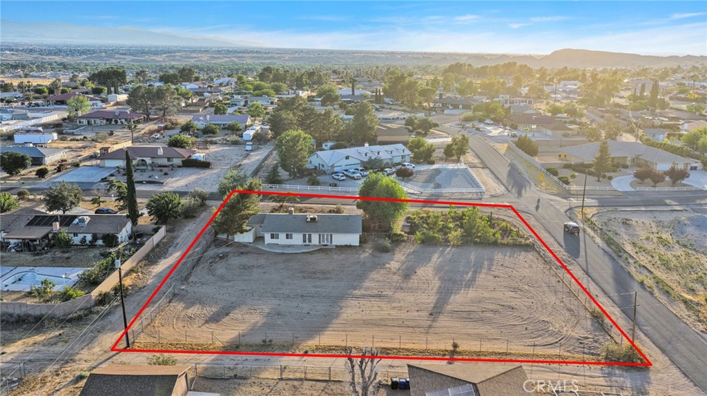 15177 Mendota Road North Apple Valley, CA 92307 - Photo 49 of 50 an aerial view of residential houses with outdoor space