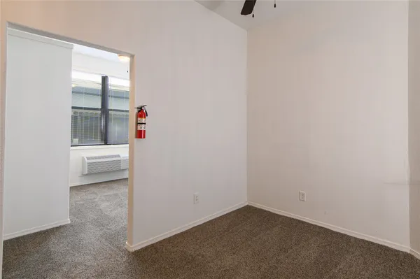 a kitchen with stainless steel appliances granite countertop a refrigerator stove and microwave