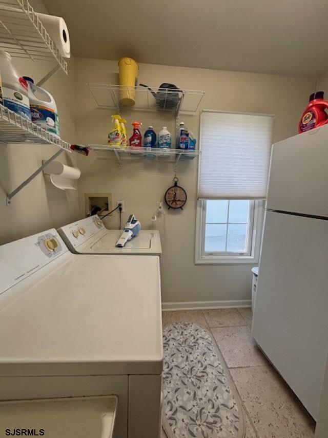 335 Gull Cove Brigantine, NJ 08203 - Photo 8 of 30 a utility room with dryer and washer