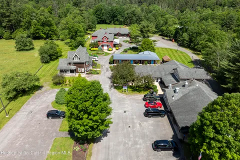 a bedroom with a bed and a table in it
