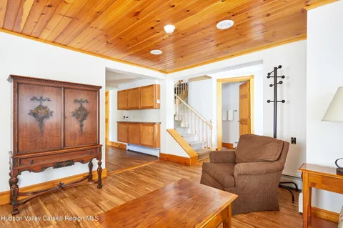 a view of a wooden fence and a yard