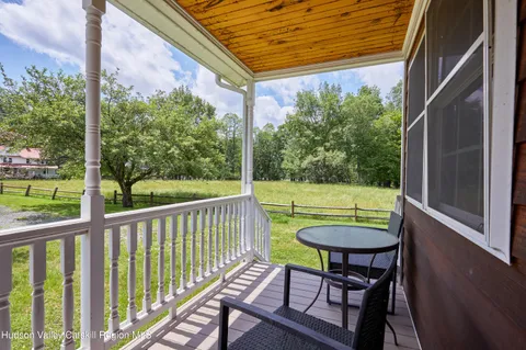 a aerial view of a house with garden and yard