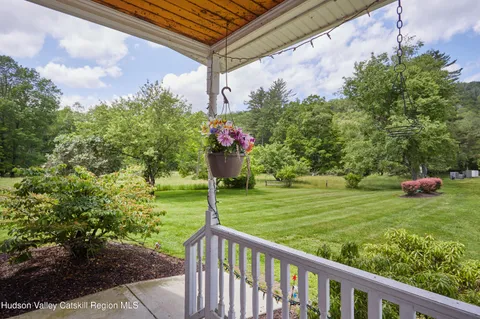 a kitchen with stainless steel appliances granite countertop a stove and a refrigerator
