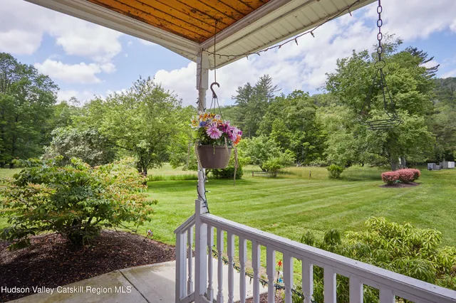 a kitchen with stainless steel appliances granite countertop a stove and a refrigerator