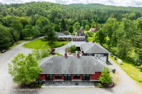 a view of walk in closet with clothes