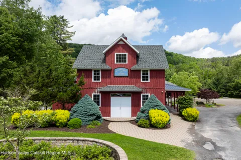 a view of a room with yard table and chairs
