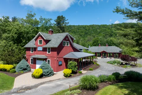 a view of a livingroom with furniture and chandelier