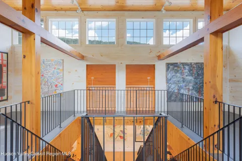 a view of a big room with windows