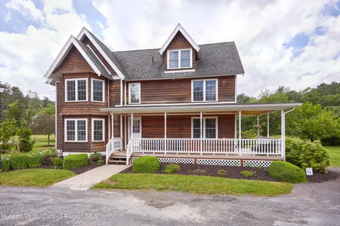 a view of a backyard with garden