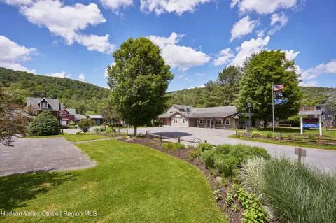 a front view of a house with a garage