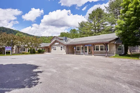a room with furniture and a window