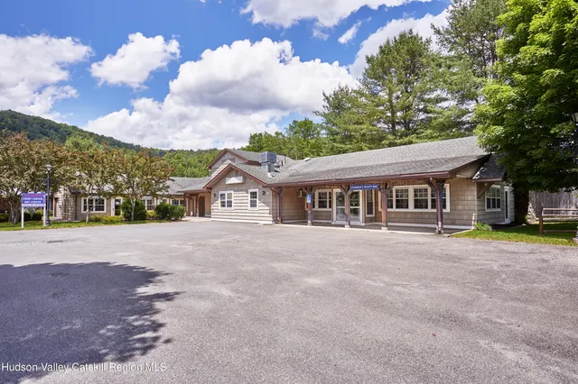 a room with furniture and a window