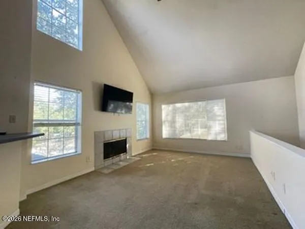 an empty room with windows