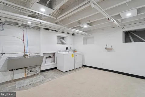 a utility room with a washer and dryer