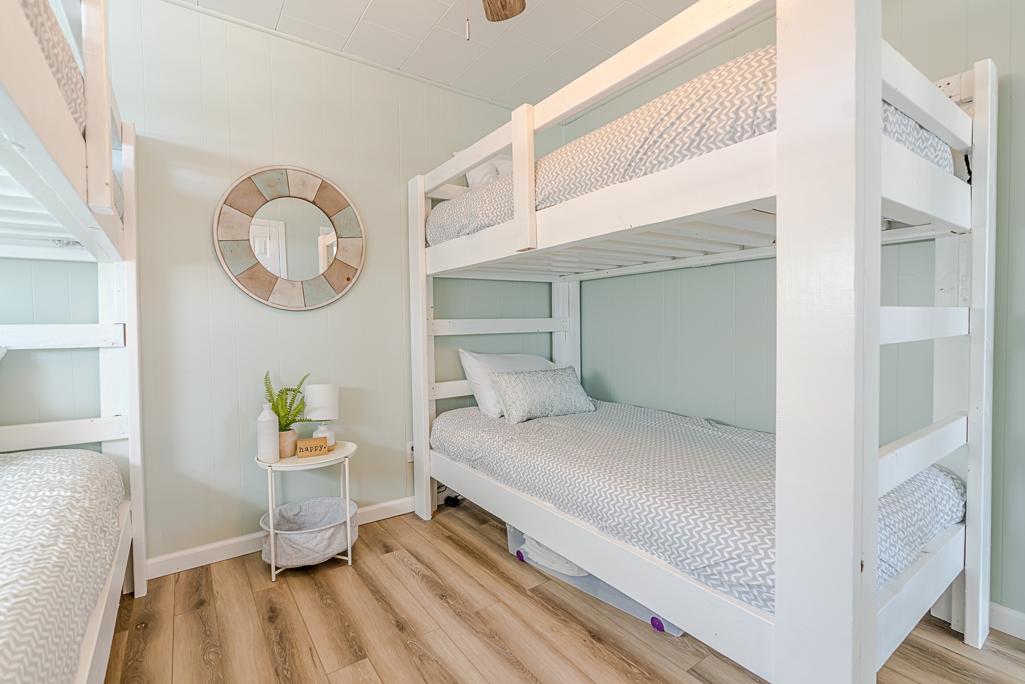 402 Seashell Drive Surfside Beach, TX 77541 - Photo 19 of 35 a bedroom with a bed and a window