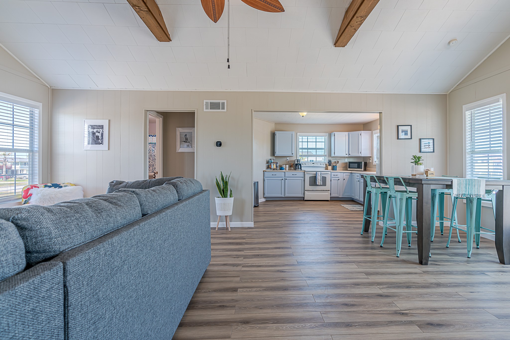 402 Seashell Drive Surfside Beach, TX 77541 - Photo 33 of 35 a living room with furniture and a wooden floor