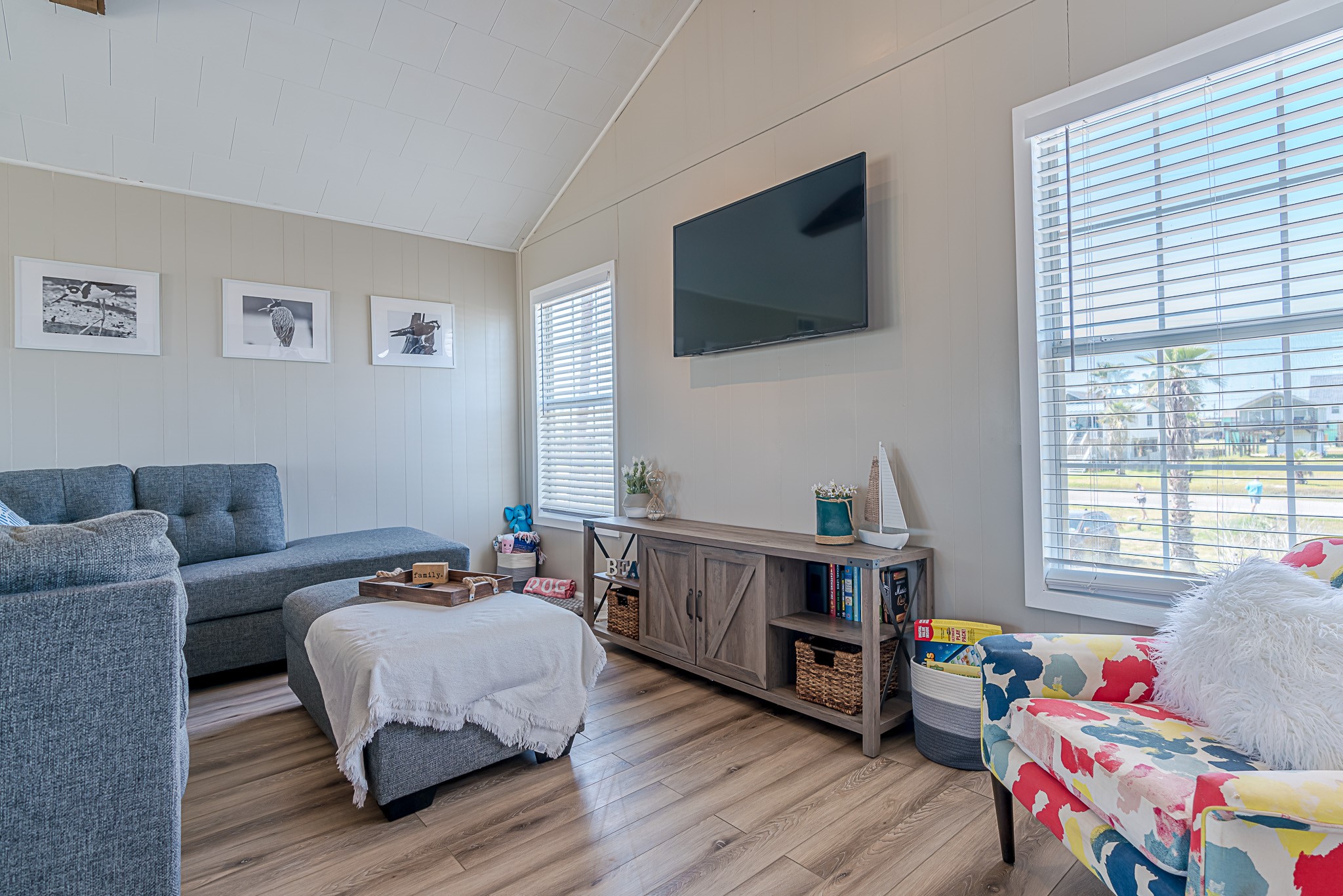 402 Seashell Drive Surfside Beach, TX 77541 - Photo 7 of 35 a living room with furniture and a flat screen tv