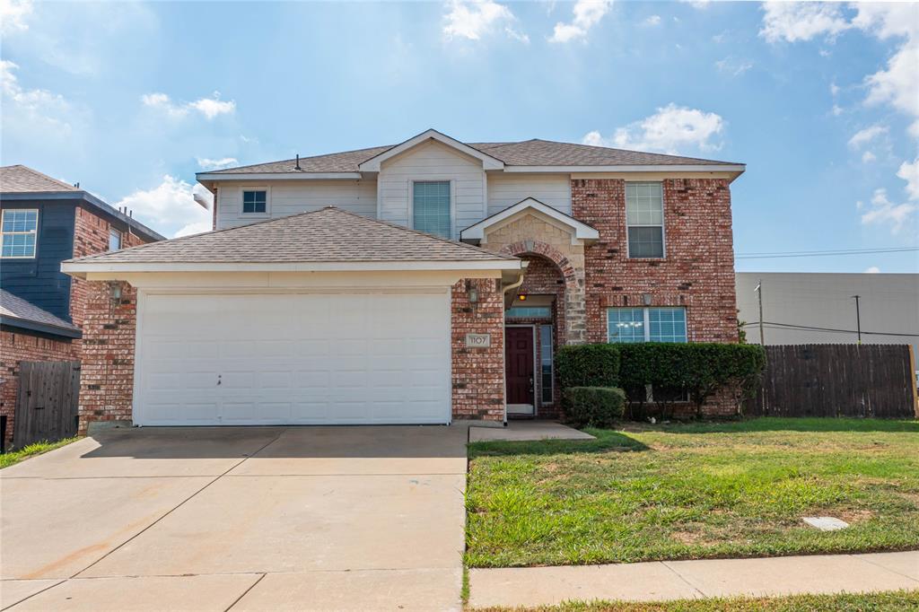 1107 Deedee Creek Drive Euless, TX 76040 - Photo 1 of 1 a front view of a house with garden