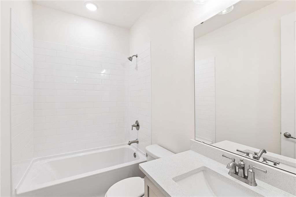 580 Barnfield Way Hiram, GA 30141 - Photo 11 of 12 a bathroom with a sink and a mirror