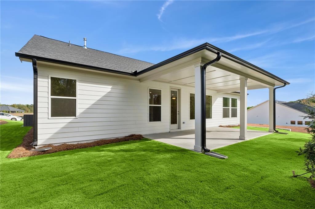 580 Barnfield Way Hiram, GA 30141 - Photo 2 of 12 a front view of a house with a yard