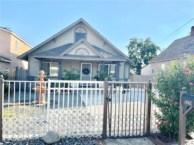 a front view of a house with a porch