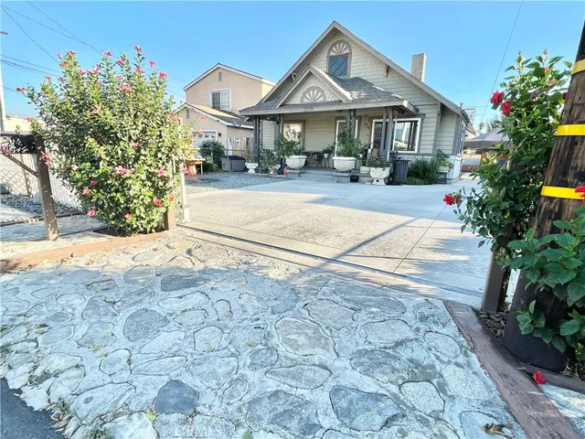 a front view of a house with yard