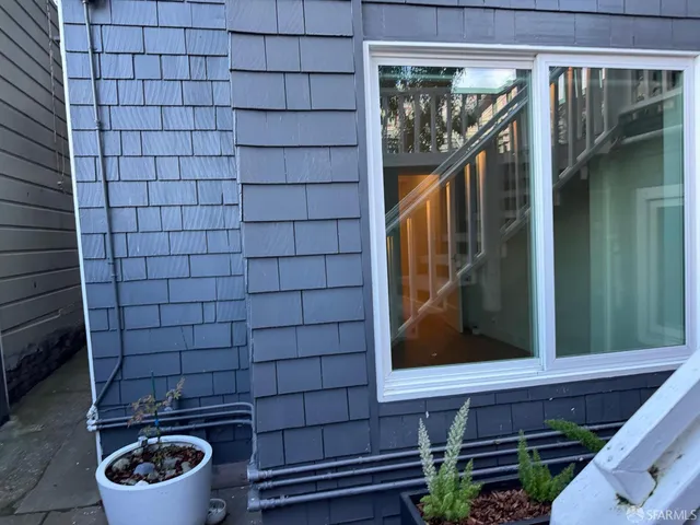 a bathroom with a toilet and a sink