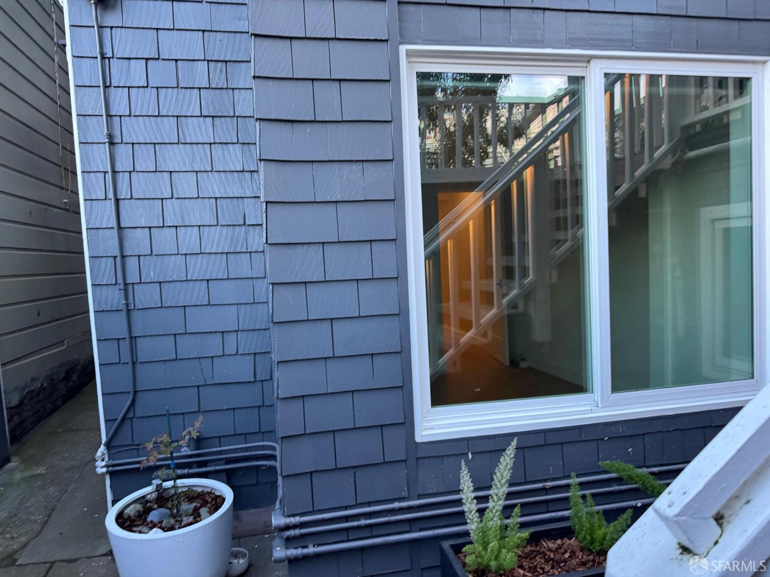 4431 20th Street, Unit A San Francisco, CA 94114 - Photo 12 of 12 a bathroom with a toilet and a sink