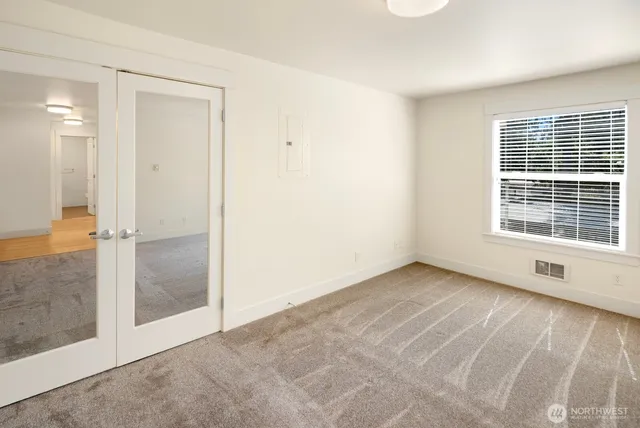 an empty room with window