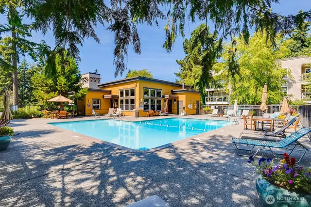 a view of a house with swimming pool