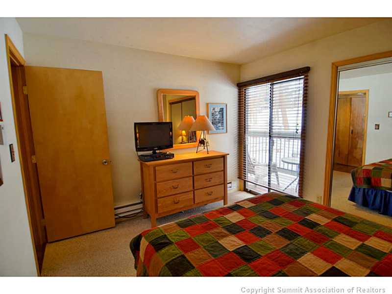 373 Wild Irishman Road, Unit 1076 Keystone, CO 80435 - Photo 16 of 25 Bedroom. Both bedrooms feature doors to the deck