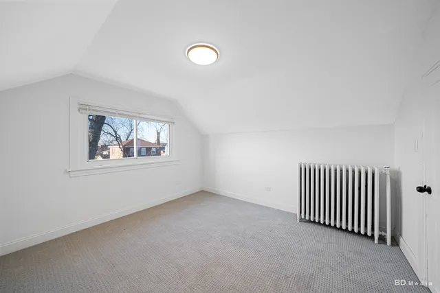 a view of gallery with wooden floor