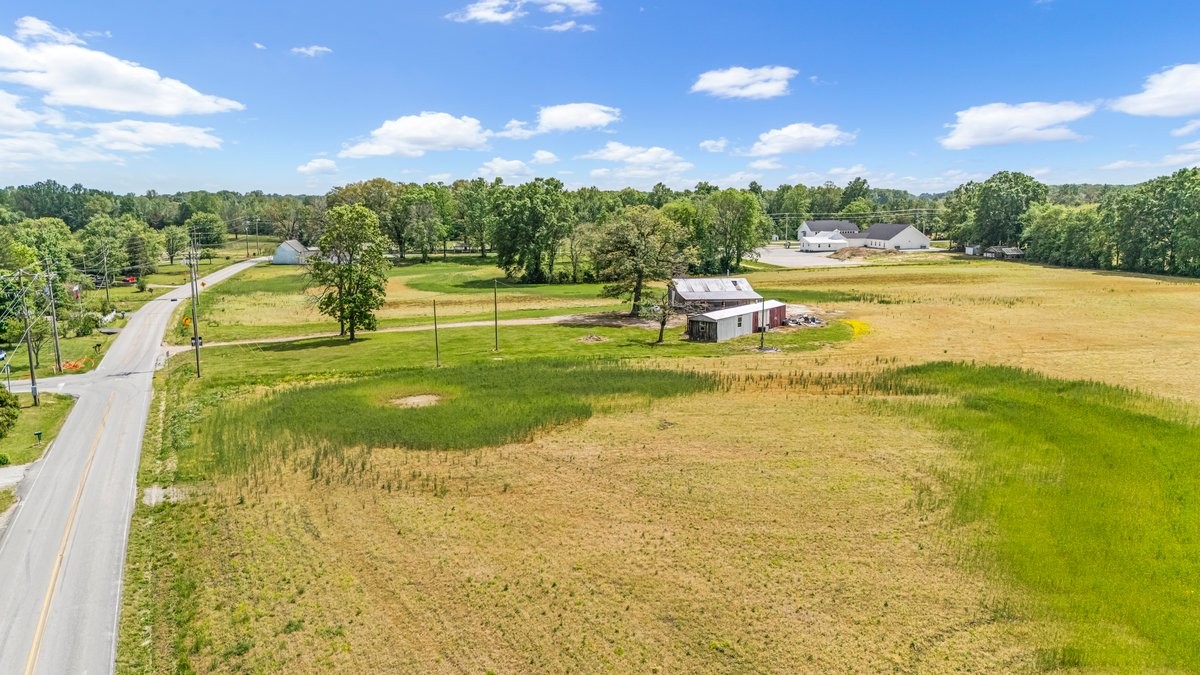 3249 Fredonia Road Manchester, TN 37355 - Photo 6 of 15 a view of a lake with a big yard