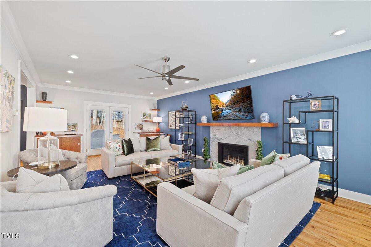 2605 Ridge Road Raleigh, NC 27612 - Photo 18 of 51 a living room with furniture and a fireplace