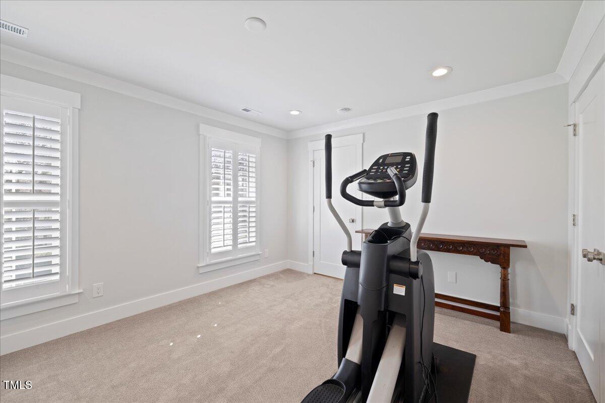 2605 Ridge Road Raleigh, NC 27612 - Photo 33 of 51 a view of a livingroom with furniture window wooden floor and a window