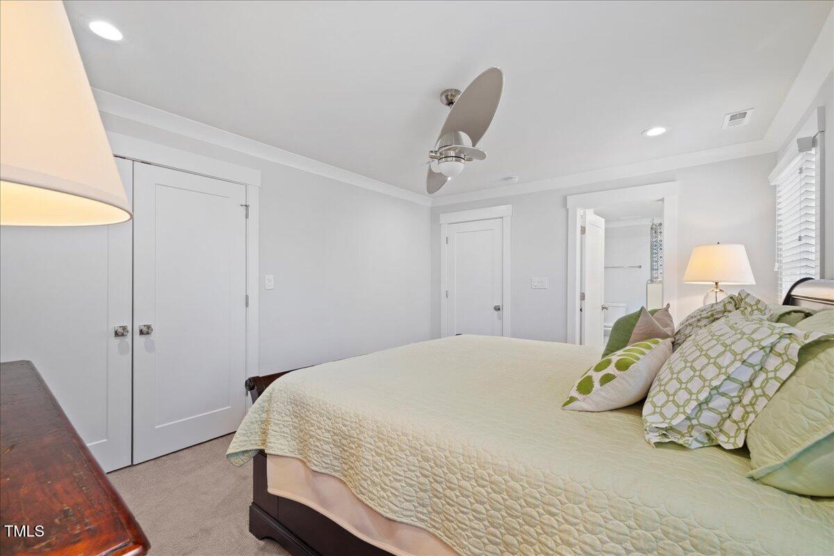 2605 Ridge Road Raleigh, NC 27612 - Photo 45 of 51 a bedroom with a bed and a window