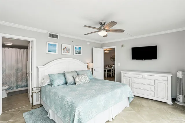 a bathroom with a granite countertop toilet sink and mirror
