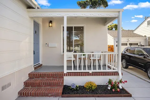 a view of a porch with a chair