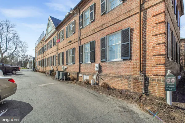 a view of a building along the street