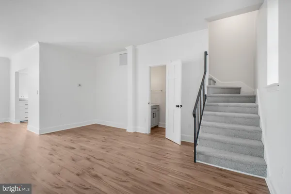 a view of entryway with wooden floor