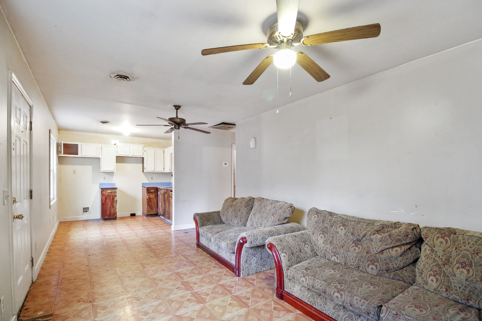 7164 Brush Creek Road South Fairview, TN 37062 - Photo 3 of 11 a living room with furniture and a chandelier